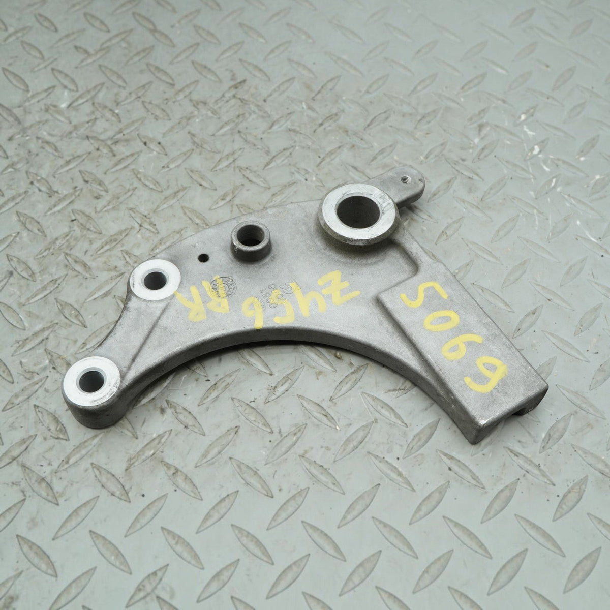 09-13 Kawasaki Vulcan VN1700J Vaquero Rear Brake Caliper Bracket Mount OEM