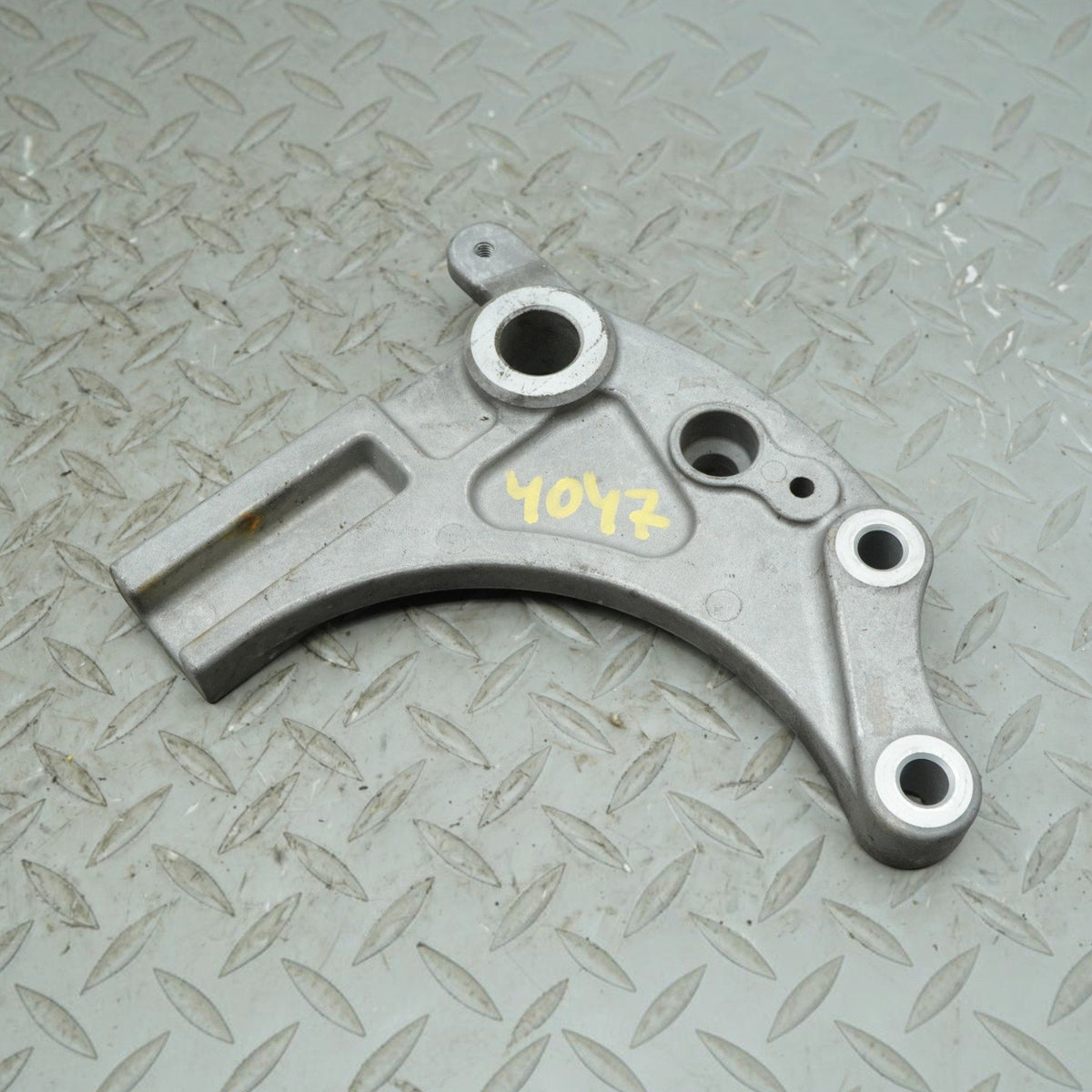 09-13 Kawasaki Vulcan VN1700J Vaquero Rear Brake Caliper Bracket Mount OEM